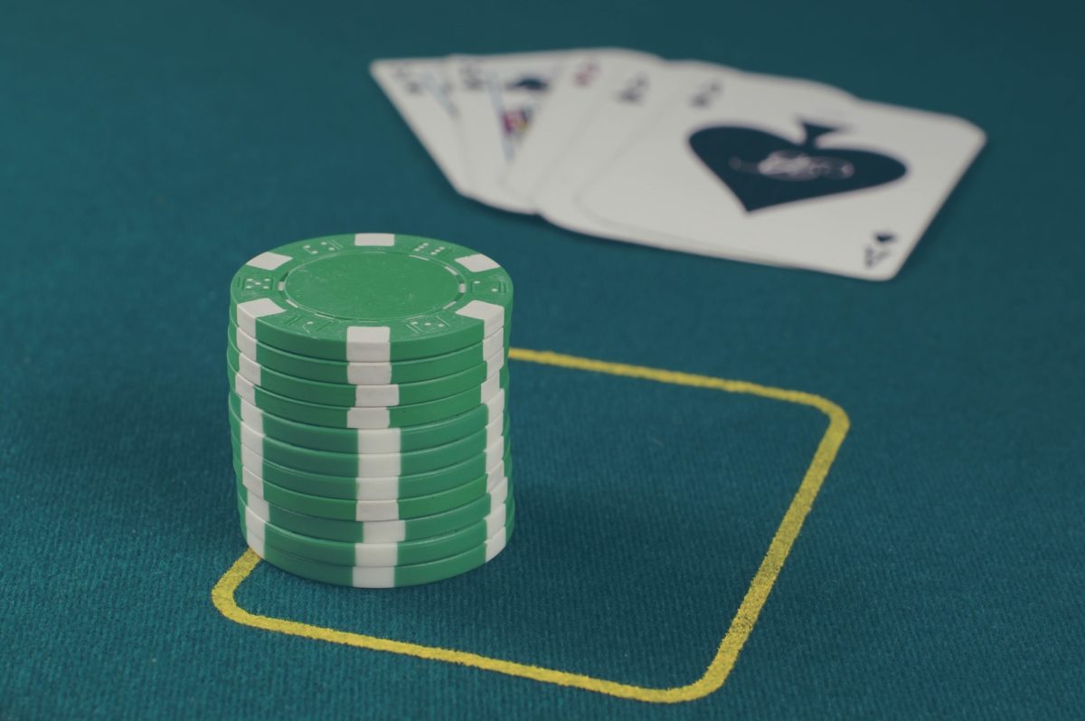 green poker chips on table