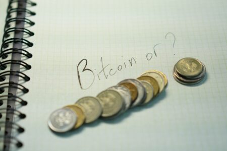 Coins Lay Under “Bitcoin Or ?” Words