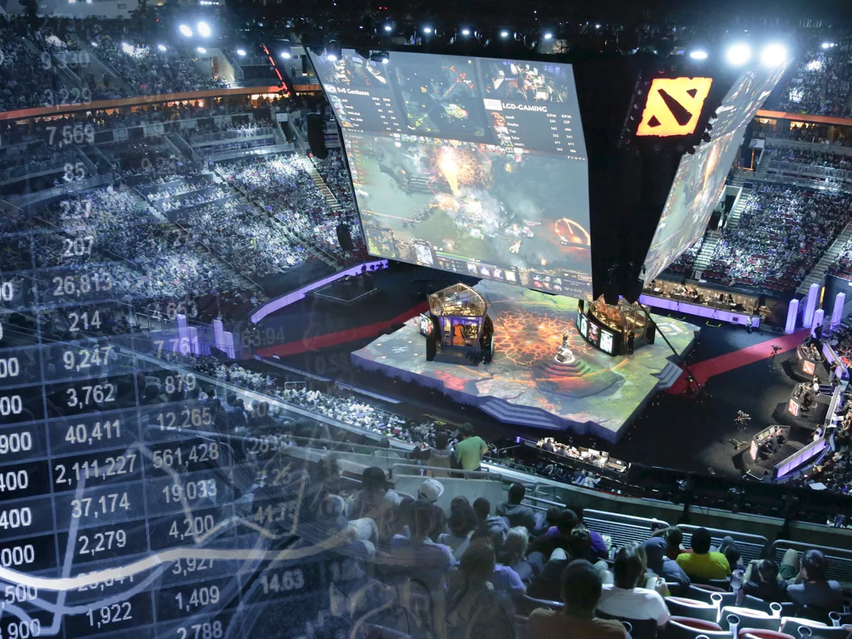 A Packed Esports Arena Featuring A Dota 2 Tournament With An Overlay Of Financial Data, Representing The Intersection Of Esports And Betting Markets.
